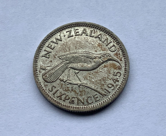 1945 higher grade New Zealand Sixpence coin .500 silver